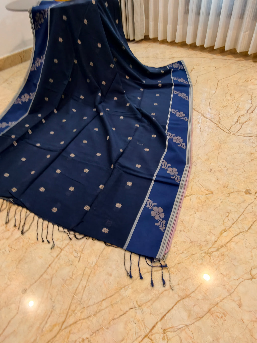 Navy Bengal cotton saree with woven motifs and floral side border