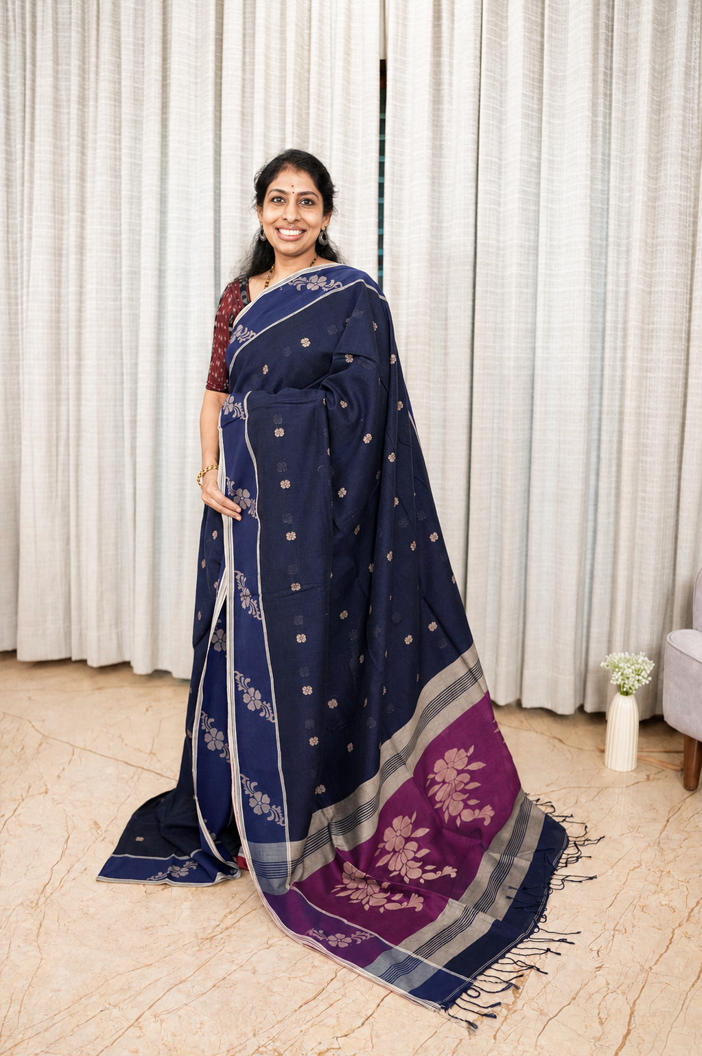 Model wearing Neelanjana navy blue Bengal cotton saree