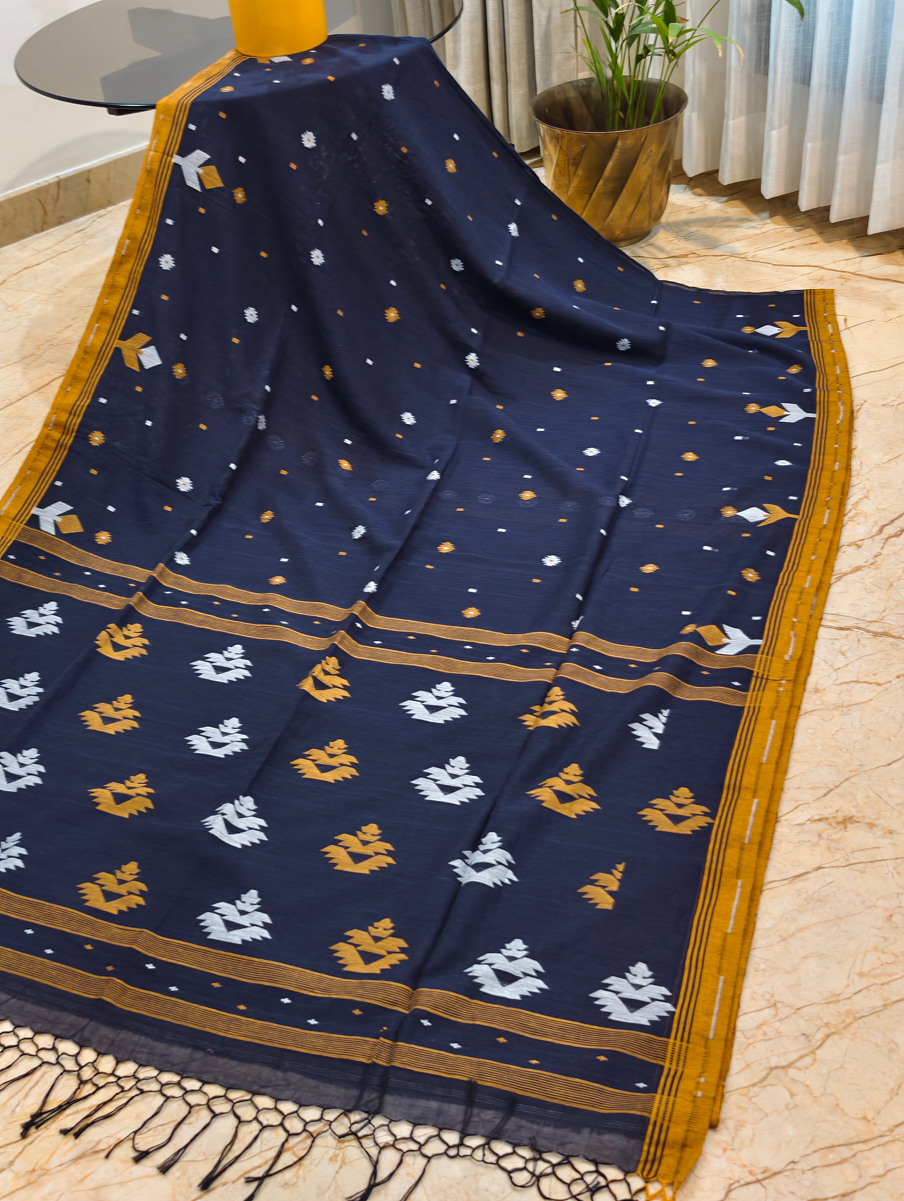 Nishitha navy blue Bengal cotton saree with mustard border and woven white and mustard motifs