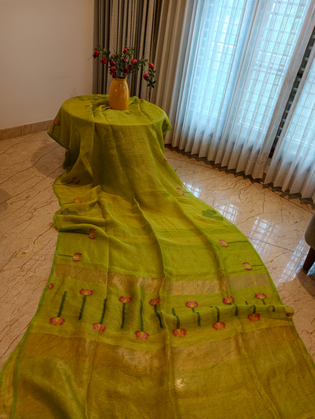 Full view of parrot green linen silk saree with floral pallu and gold zari border – Nayikaa