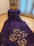 Full view of purple Matka Muslin Jamdani saree with gold and white floral pallu