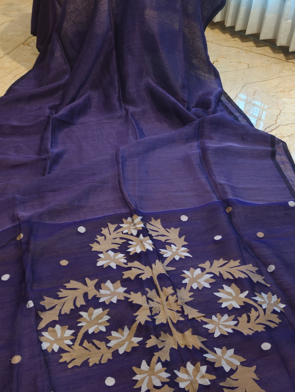 Purple Matka Muslin Jamdani saree with handwoven gold and white floral motifs
