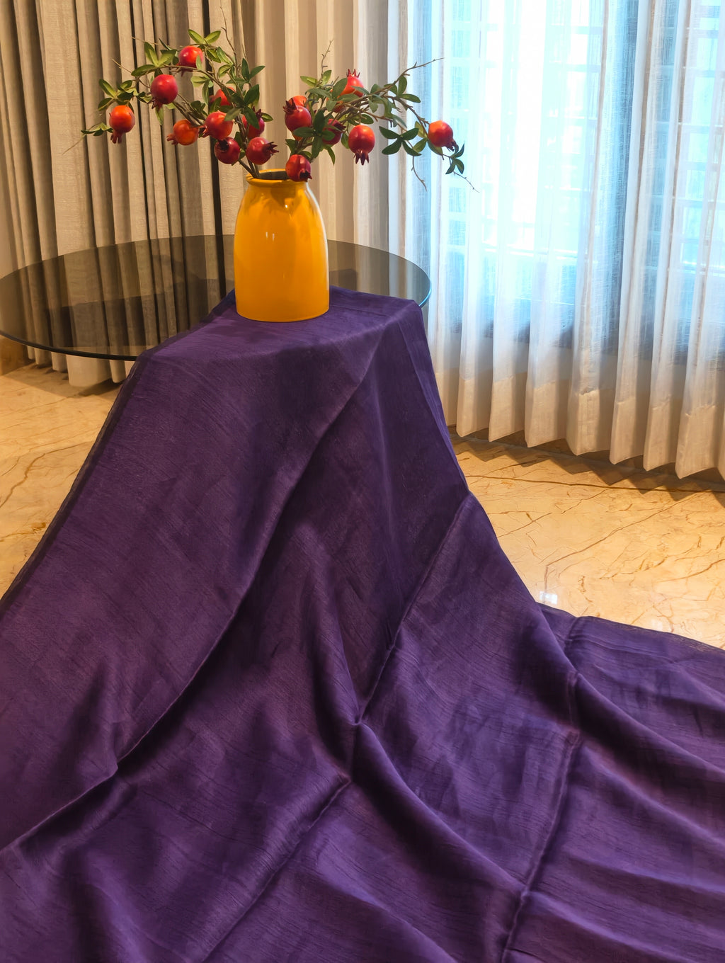 Textured purple body of the Matka Muslin Jamdani saree with a subtle sheen
