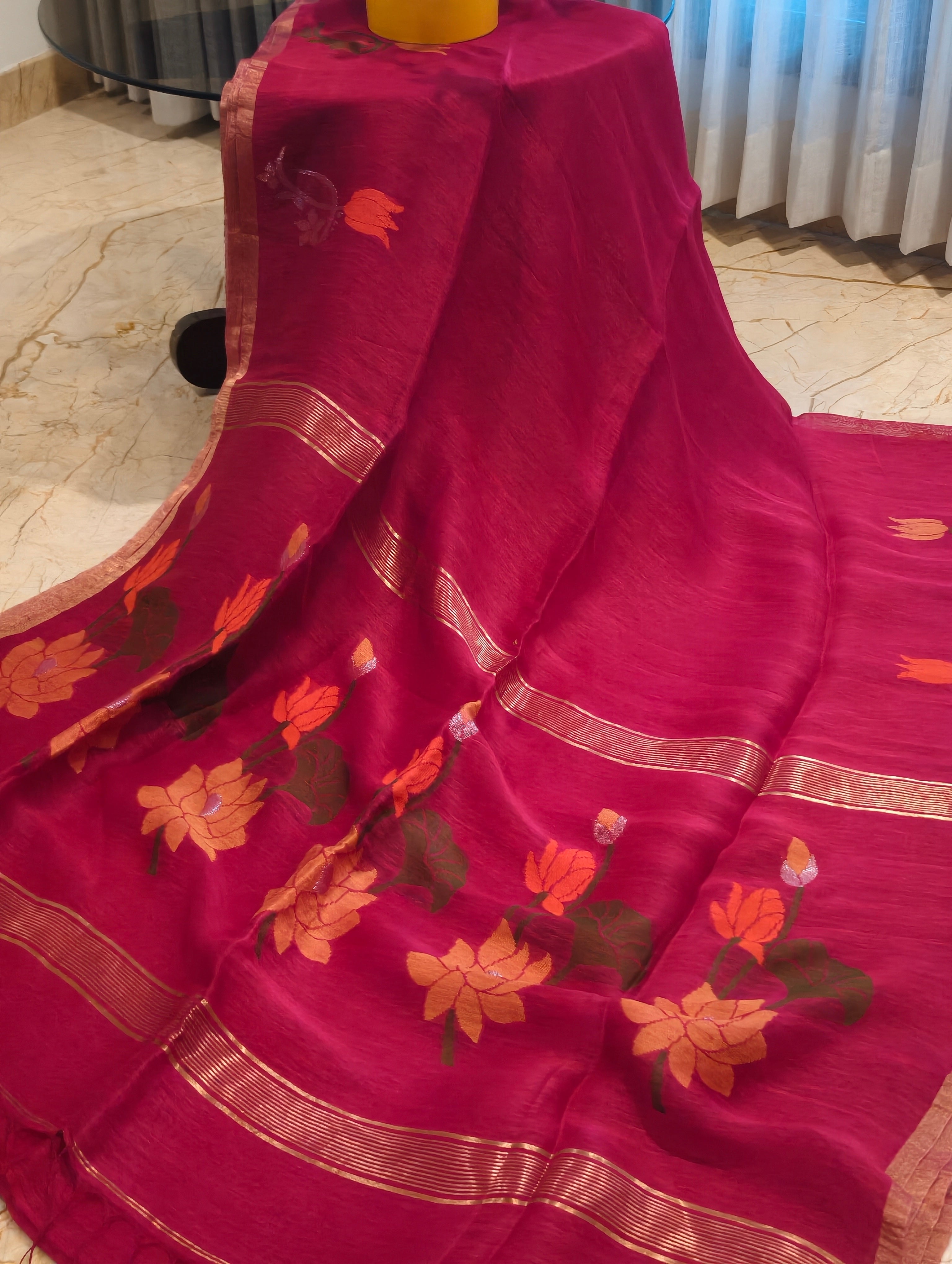Dark pink Matka Silk Jamdani saree with handwoven floral motifs and zari border